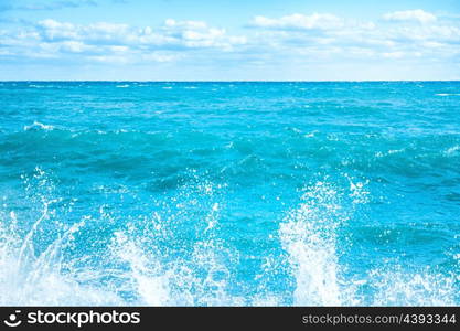 Big wave on the blue sea. Surf and foam