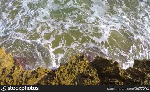 Big waves on the coastal in Spain, small town Palamos ,slow motion