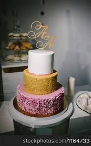 Big wedding cake close-up on the wedding table. Big wedding cake close-up on the wedding table close up