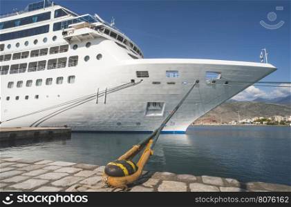 Big white cruise ship. Synny day. Greece