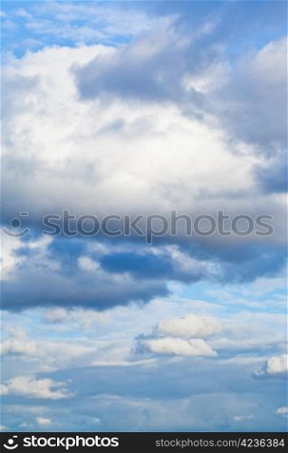 big white cumulus cloud in afternoon autumn sky