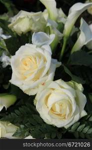 Big white roses in a floral arrangement