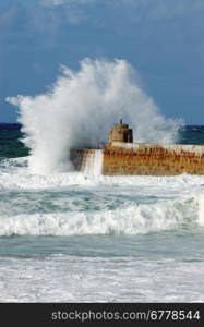 Big white water wave splash, Portreath pier, Cornwall