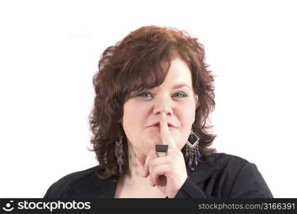 Big woman putting her finger to her lips
