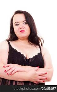 Big woman wearing lace lingerie standing with arms folded, on white.. Big woman in underwear with arms folded