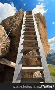 big wooden ladder in Bepi Zac via ferrata, Trentino, Italy