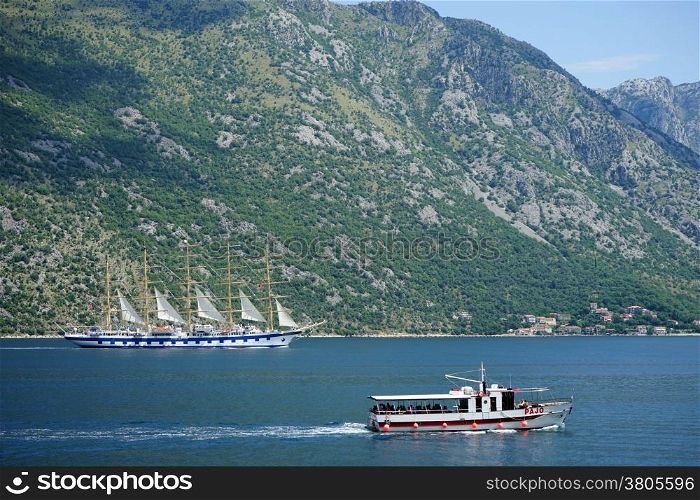 Big yacht and motor boat in Kotor bay, Montenegro