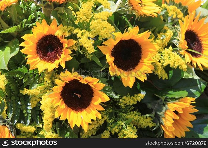 Big yellow sunflower in a sunflower arrangement