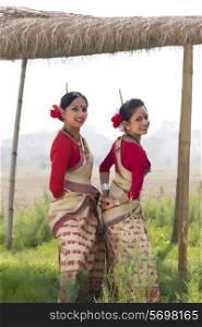 Bihu women dancing together