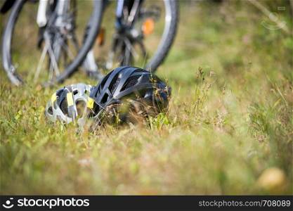 Bike helmets in the grass, bike tour