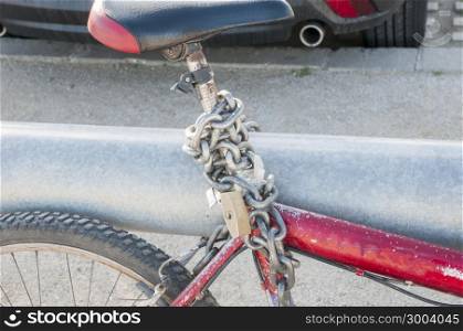 bike padlocked so no one can steal