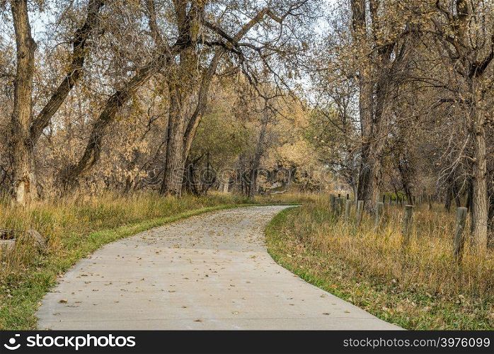 bike trail in late fall scenery along the Poudre River in northern Colorado