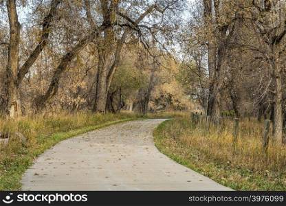 bike trail in late fall scenery along the Poudre River in northern Colorado