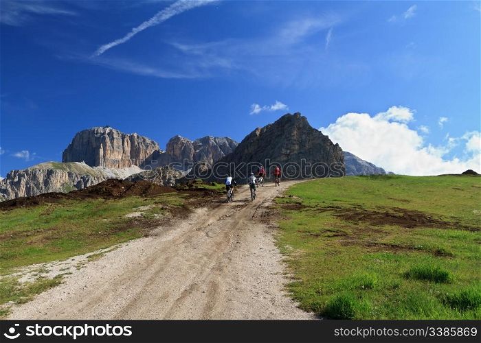 biker on high mountain road, Italian Dolomites