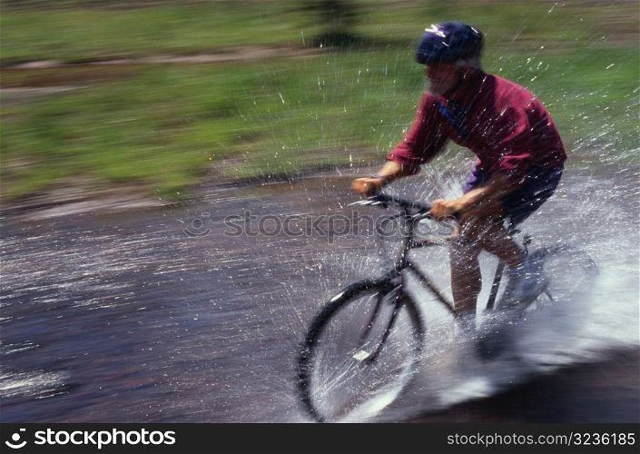 Biking Through Stream