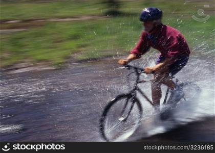 Biking Through Stream