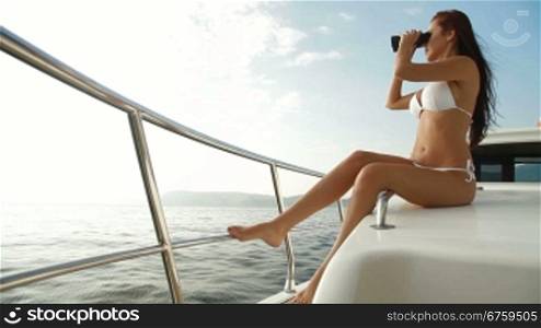 Bikini Beauty With Binoculars on Luxury Yacht