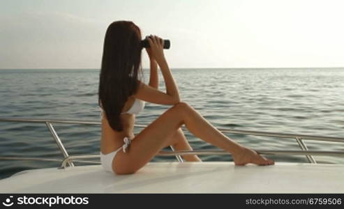 Bikini Beauty With Binoculars on Luxury Yacht