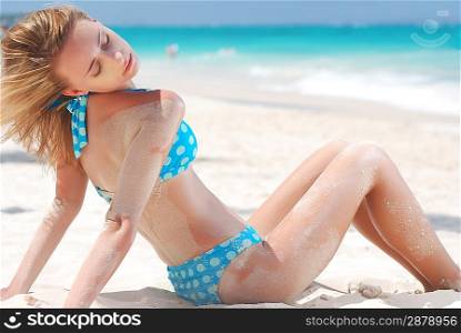 Bikini girl on caribbean beach
