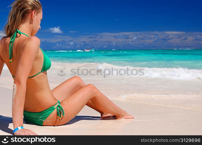 Bikini girl on caribbean beach