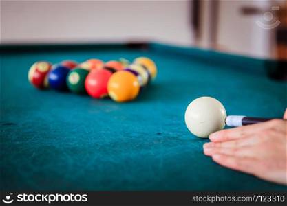 Billard balls and table in a bar.
