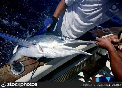Billfish white Marlin catch and release on boat board