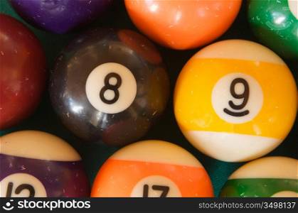 Billiard balls photographed from above too close together