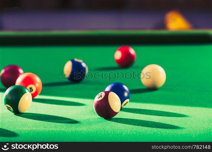 Billiard cue balls on green table. Pool game. Snooker ball on billiard table