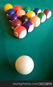 billiard-table with fifteen balls arranged as triangle