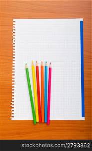 Binder and pencils isolated on the background