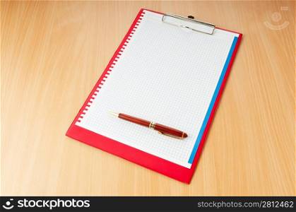 Binder with blank page with pen