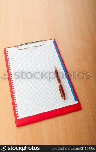 Binder with blank page with pen
