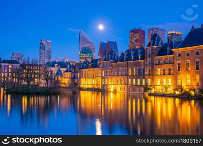 Binnenhof castle (Dutch Parliament) cityscape downtown skyline of Hague in Netherlands at sunset