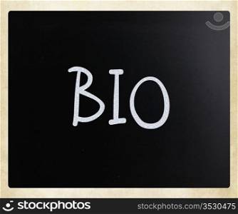 ""Bio" handwritten with white chalk on a blackboard."