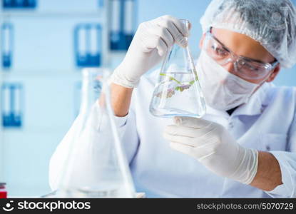 Biotechnology concept with scientist in lab