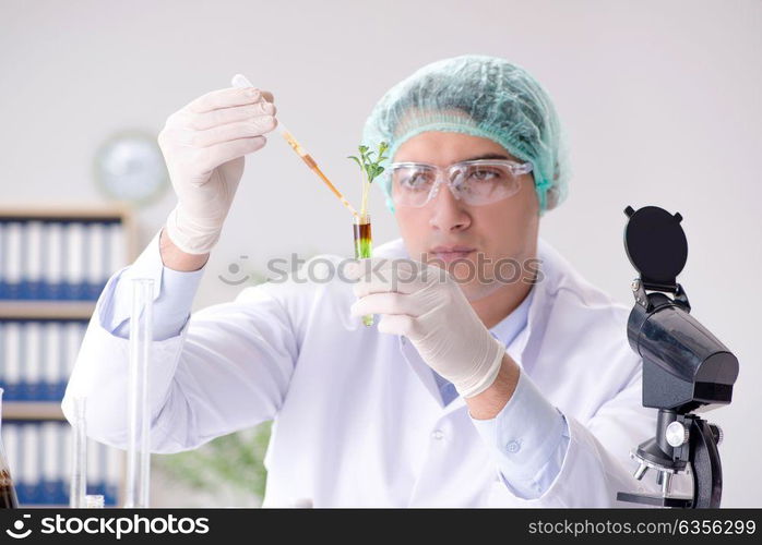 Biotechnology concept with scientist in lab