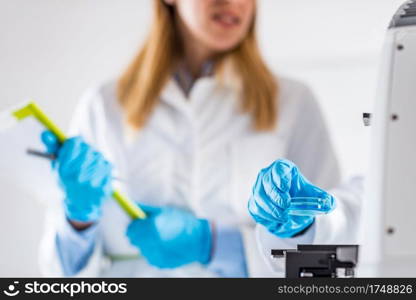  Biotechnology. Female scientists working in laboratory 