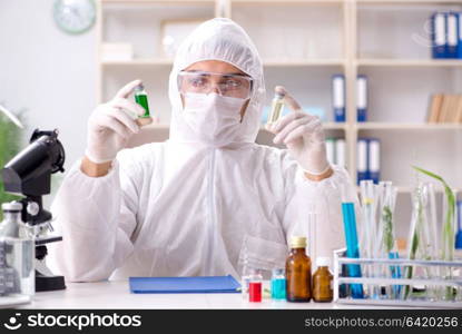 Biotechnology scientist chemist working in lab