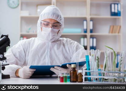 Biotechnology scientist chemist working in lab