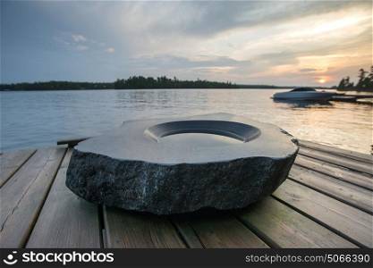 Birdbath on a dock, Lake of The Woods, Ontario, Canada