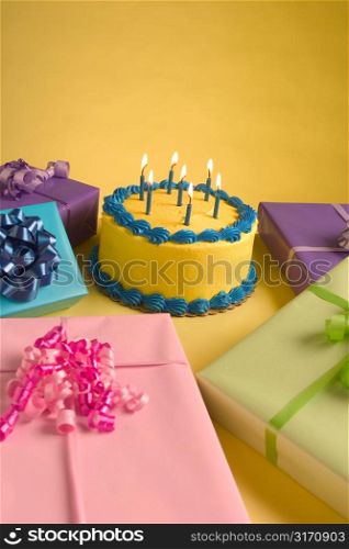 Birthday Cake Surrounded by Presents