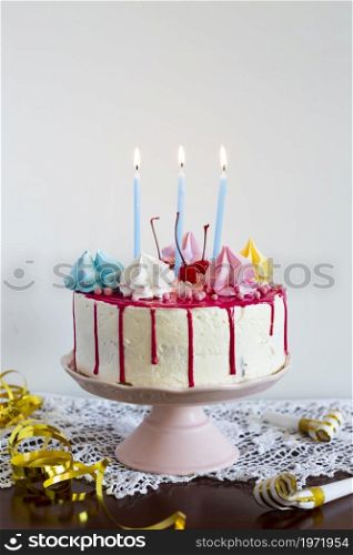 birthday cake with lit candles. High resolution photo. birthday cake with lit candles. High quality photo