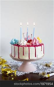 birthday cake with lit candles. High resolution photo. birthday cake with lit candles. High quality photo