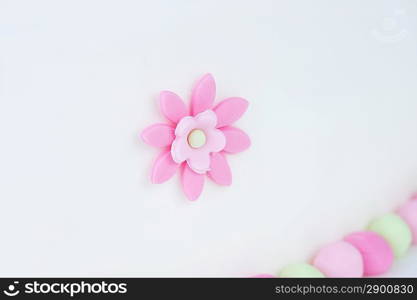 birthday cake with white frosting and flowers of cream