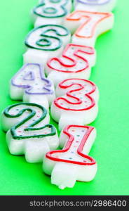 Birthday candles against colourful background