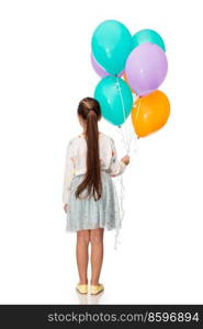 birthday, childhood and people concept - portrait of smiling little girl party hat with balloons over white background. happy girl in birthday party hat with balloons