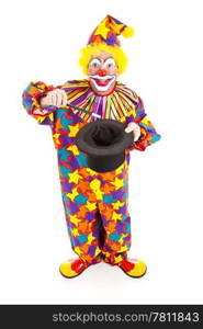 Birthday clown does a magic trick. Full body isolated on white.