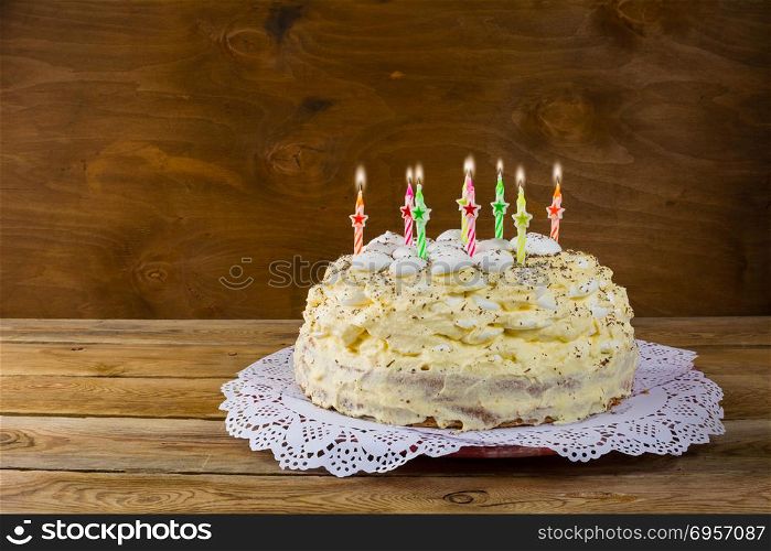Birthday meringue cake with burning candles. Birthday meringue cake with burning candles. Birthday Cake. Meringue cake. Pavlova. Birthday card