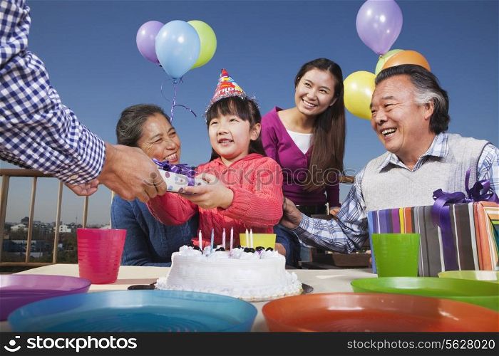 Birthday part, multi-generation family