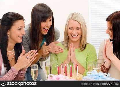 Birthday party - group of woman celebrate with cake and champagne